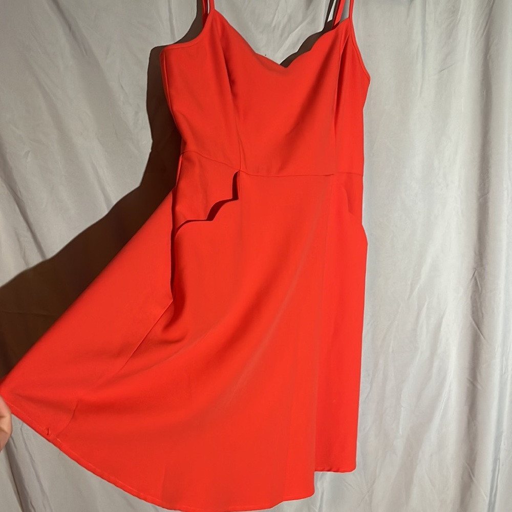 Red scallop mini dress with pockets and open back